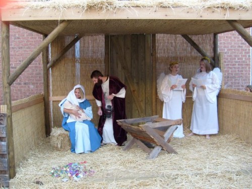 Robert played the part of baby Jesus in 6 different nativites. This was his biggest performance during our church's "Walk Through Bethlehem" event, with his Daddy as Joseph and his aunt as Mary...Mommy was the photographer.