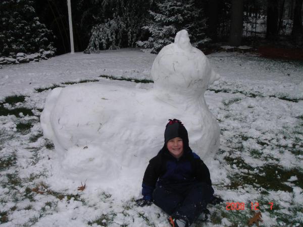 my son infront of the snowcat we made