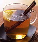tea with lemon wedge cinnamon stick stirrer